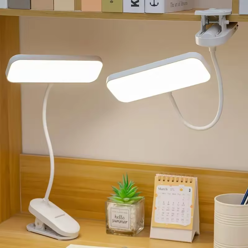 A dimmable LED desk lamp with adjustable color temperature and bendable lamp tube - touch reading lamp with lampshade, 800 mAh b