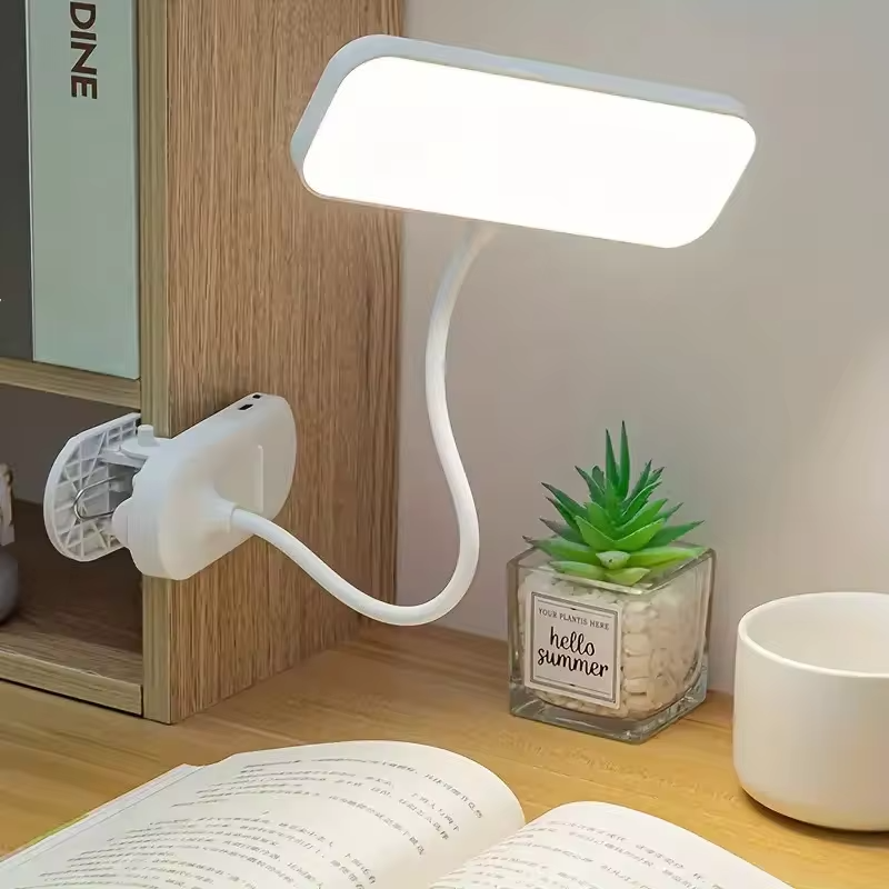 A dimmable LED desk lamp with adjustable color temperature and bendable lamp tube - touch reading lamp with lampshade, 800 mAh b
